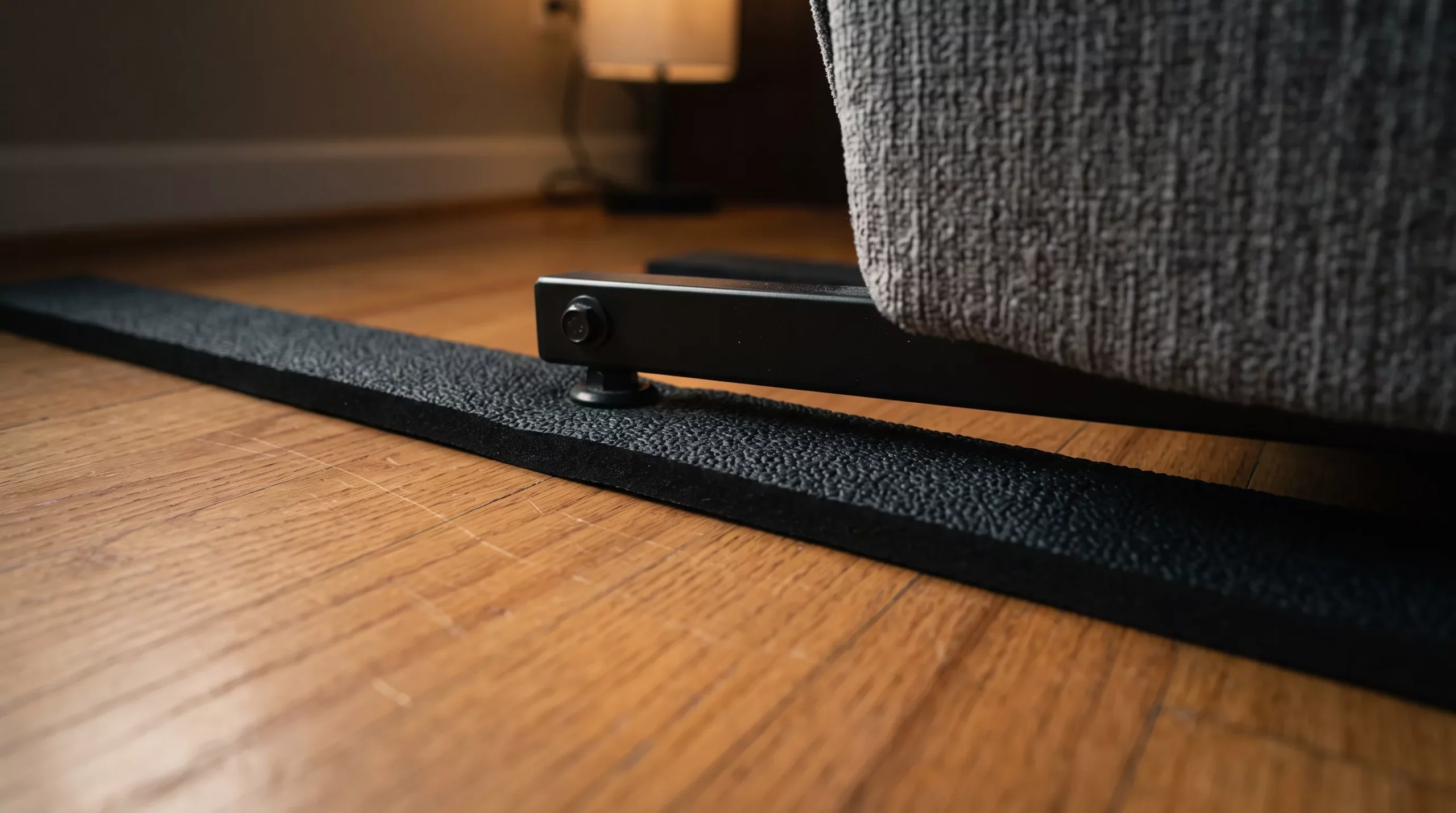 Recliner floor gripper pads stopping a fixed recliner from wobbling