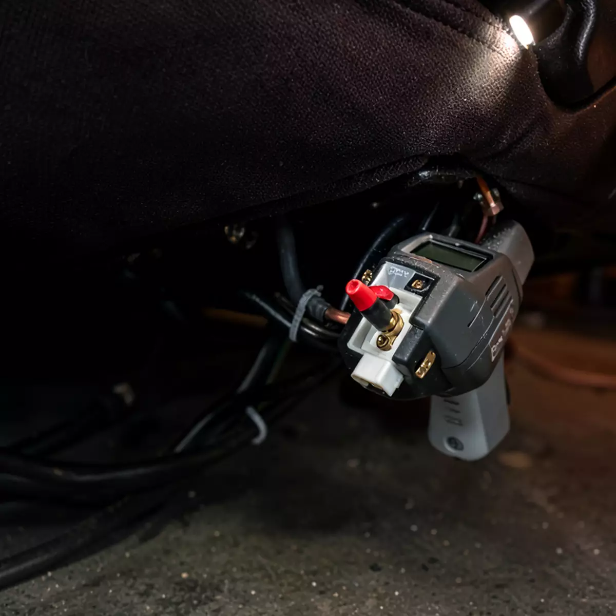 testing a power recliner motor connector with a multimeter