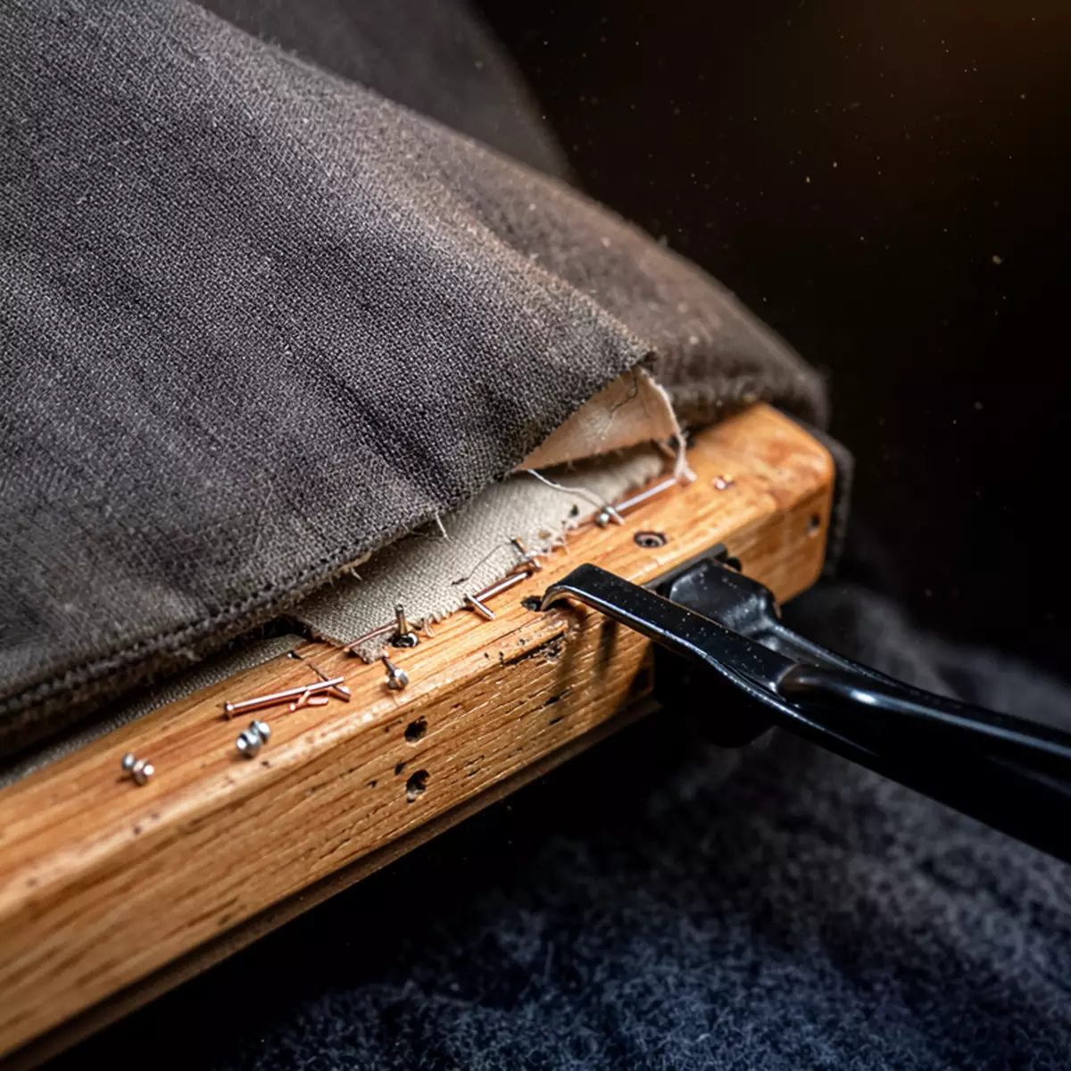 removing old upholstery from a recliner